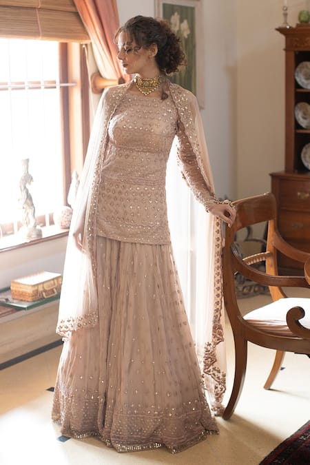 Astha Narang Beige Main Material Netlining Semi Embroidered Kurta Gharara Set  