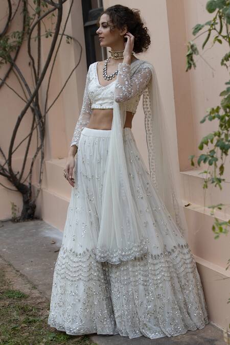 Buy Astha Narang White Main Material Netlining Semi Crepe V Neck Embroidered Lehenga Set Online at Aza Fashions Buy_Astha Narang_White Main Material Netlining Semi Crepe V Neck Embroidered Lehenga Set _Online_at_Aza_Fashions