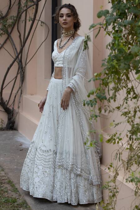 Shop Astha Narang White Main Material Netlining Semi Crepe V Neck Embroidered Lehenga Set Online at Aza Fashions Shop_Astha Narang_White Main Material Netlining Semi Crepe V Neck Embroidered Lehenga Set _Online_at_Aza_Fashions