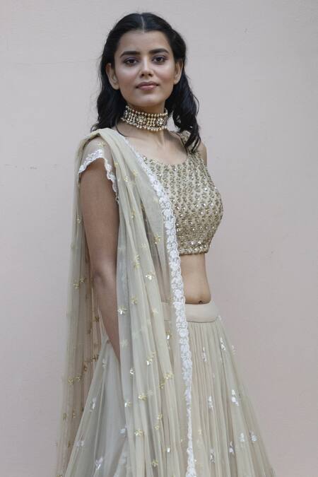 Buy Astha Narang Beige Main Material Netlining Semi Crepe Round Embroidered Lehenga Set Online at Aza Fashions Buy_Astha Narang_Beige Main Material Netlining Semi Crepe Round Embroidered Lehenga Set _Online_at_Aza_Fashions