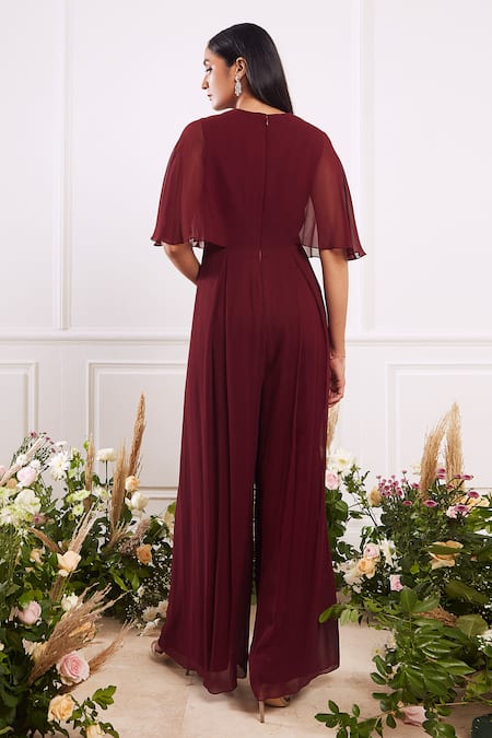 Shop Seema Thukral Maroon Georgette Lining Satin V Neck Pleated Flared Jumpsuit at Aza Fashions Shop_Seema Thukral_Maroon Georgette Lining Satin V Neck Pleated Flared Jumpsuit_at_Aza_Fashions