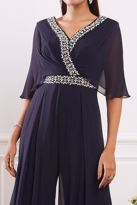 Seema Thukral_Blue Georgette Lining Satin V Neck Pleated Flared Jumpsuit_Online_at_Aza_Fashions