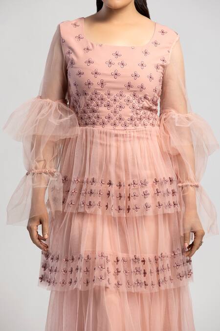 S & V Designs_Peach Banana , Poly And Nylon Net Floral Work Pleated Layered Gown_at_Aza_Fashions