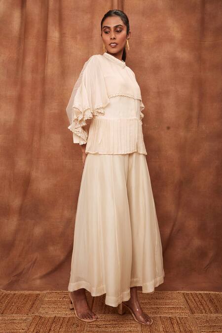 Jajobaa_Cream Silk Organza Chinnon Round Overlay Ruffle Top And Flared Pant Set_Online_at_Aza_Fashions