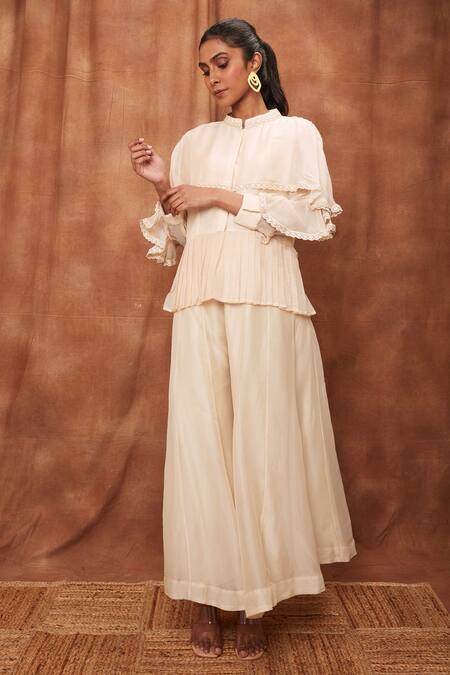 Shop_Jajobaa_Cream Silk Organza Chinnon Round Overlay Ruffle Top And Flared Pant Set_Online_at_Aza_Fashions