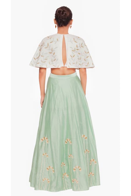 Shop Salt And Spring Green Chanderi Leaf And Floral Motifs Round Embroidered Cape & Skirt Set at Aza Fashions Shop_Salt And Spring_Green Chanderi Leaf And Floral Motifs Round Embroidered Cape & Skirt Set _at_Aza_Fashions