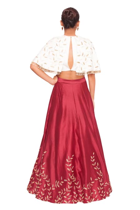Shop Salt And Spring Maroon Chanderi Leaf Motifs Round Cape Blouse And Skirt Set at Aza Fashions Shop_Salt And Spring_Maroon Chanderi Leaf Motifs Round Cape Blouse And Skirt Set _at_Aza_Fashions
