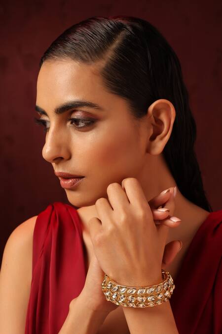 Buy Swabhimann Gold Plated Imitation Diamonds Kundan Embellished Cut Work Pattern Kada Online at Aza Fashions Buy_Swabhimann_Gold Plated Imitation Diamonds Kundan Embellished Cut Work Pattern Kada _Online_at_Aza_Fashions