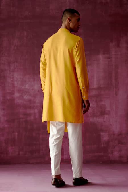 Shop Pouli Pret Yellow Cotton Satin Asymmetric Overlap Kurta at Aza Fashions Shop_Pouli Pret_Yellow Cotton Satin Asymmetric Overlap Kurta _at_Aza_Fashions