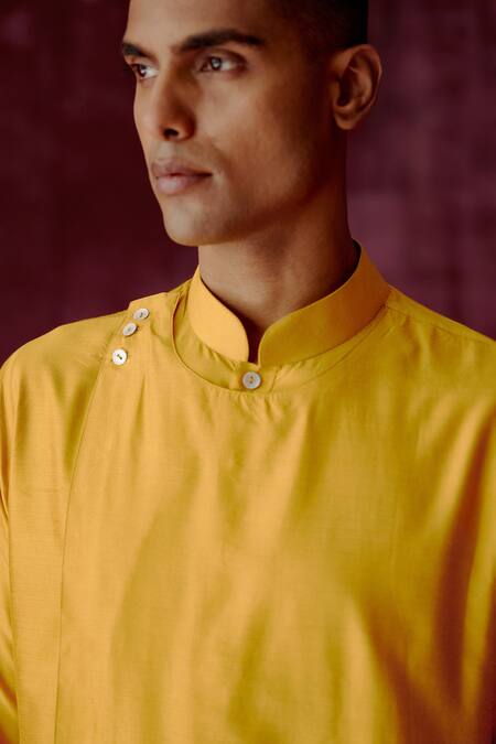 Buy Pouli Pret Yellow Cotton Satin Asymmetric Overlap Kurta Online at Aza Fashions Buy_Pouli Pret_Yellow Cotton Satin Asymmetric Overlap Kurta _Online_at_Aza_Fashions