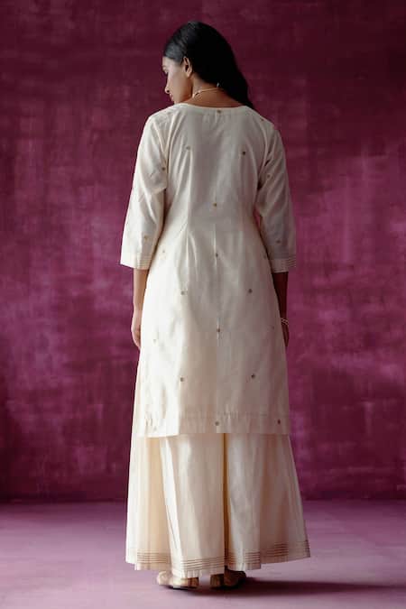 Shop Pouli Pret Off White Organza, Chanderi, Lining Cotton Embroidered Kurta Gharara Set at Aza Fashions Shop_Pouli Pret_Off White Organza, Chanderi, Lining Cotton Embroidered Kurta Gharara Set _at_Aza_Fashions