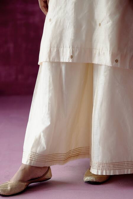 Shop Pouli Pret Off White Organza, Chanderi, Lining Cotton Embroidered Kurta Gharara Set Online at Aza Fashions Shop_Pouli Pret_Off White Organza, Chanderi, Lining Cotton Embroidered Kurta Gharara Set _Online_at_Aza_Fashions