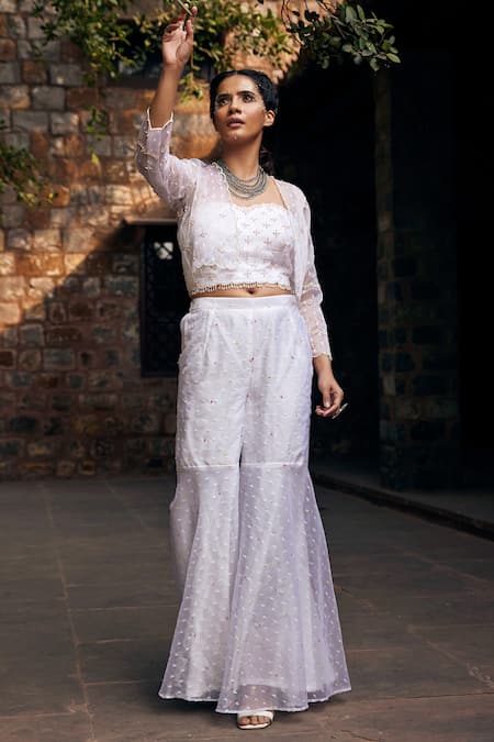 Shop Tarini Vij White Dobby Textured Organza Bead Work, Sequins, Surai Mahi Jacket Sharara Set at Aza Fashions Shop_Tarini Vij_White Dobby Textured Organza Bead Work, Sequins, Surai Mahi Jacket Sharara Set _at_Aza_Fashions