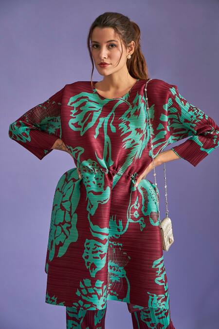 Shop Tasuvure Maroon Pleated Fabric Floral Print Round Olivia Tunic And Flared Pant Set Online at Aza Fashions Shop_Tasuvure_Maroon Pleated Fabric Floral Print Round Olivia Tunic And Flared Pant Set _Online_at_Aza_Fashions