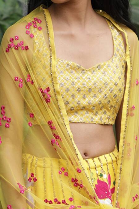 Buy_Taavare_Yellow Raw Silk, Georgette Wildflower Leaf Neck Embroidered Bridal Lehenga Set_Online_at_Aza_Fashions