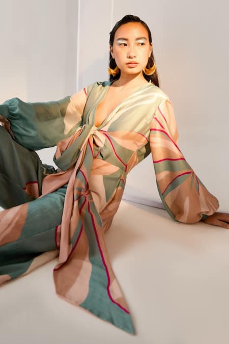 Shop_Twinkle Hanspal_Blue Chanderi Floral Plunge Neck Printed Tie Up Jumpsuit _Online_at_Aza_Fashions