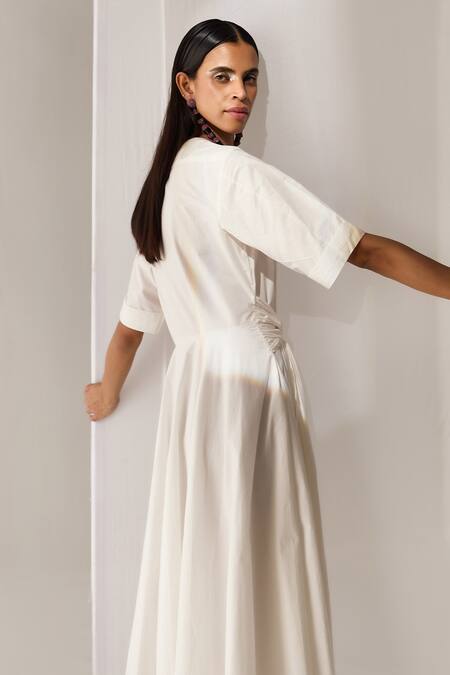 Shop_Twinkle Hanspal_White Cotton Poplin Solid V Neck Front Tie Up Dress _Online_at_Aza_Fashions