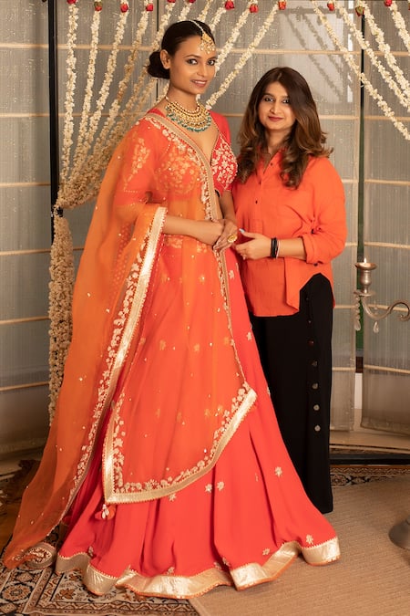 Tanu Malhotra_Coral Blouse- Modal Silk Lehenga Georgette Dupatta Organza Tilla Set _at_Aza_Fashions