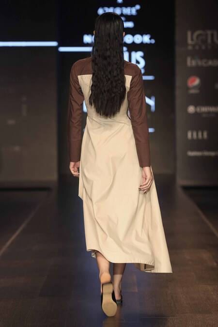 Shop NOTEBOOK Beige Cotton Poplin Asymmetric Midi Dress at Aza Fashions Shop_NOTEBOOK_Beige Cotton Poplin Asymmetric Midi Dress_at_Aza_Fashions