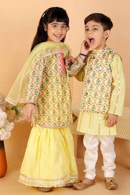 Shop The Plum Bum Yellow Chanderi, , Net, Satin Mughal Jaal Print Kurta Sharara Set at Aza Fashions Shop_The Plum Bum_Yellow Chanderi, , Net, Satin Mughal Jaal Print Kurta Sharara Set _at_Aza_Fashions
