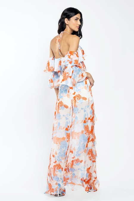 Shop Mandira Wirk Resort White Chiffon Tropical Motifs Halter Neck Top And Slit Pant Set at Aza Fashions Shop_Mandira Wirk Resort_White Chiffon Tropical Motifs Halter Neck Top And Slit Pant Set _at_Aza_Fashions