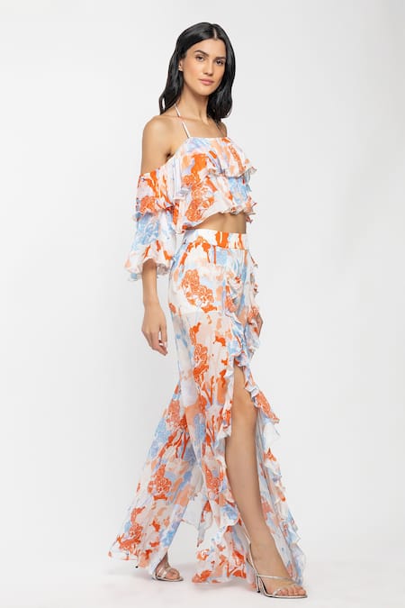 Mandira Wirk Resort White Chiffon Tropical Motifs Halter Neck Top And Slit Pant Set Online at Aza Fashions Mandira Wirk Resort_White Chiffon Tropical Motifs Halter Neck Top And Slit Pant Set _Online_at_Aza_Fashions