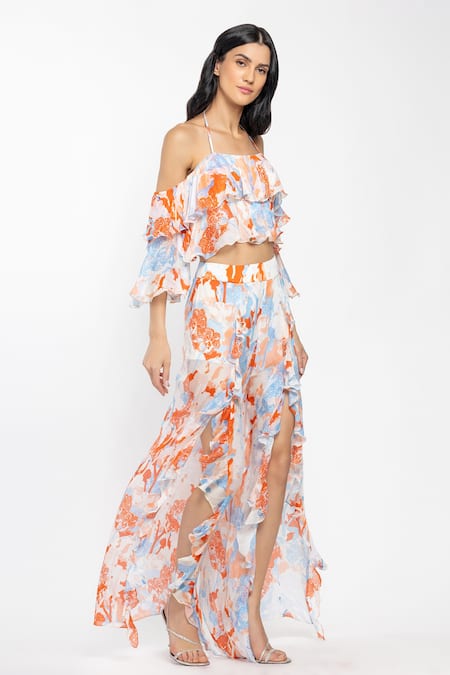 Buy Mandira Wirk Resort White Chiffon Tropical Motifs Halter Neck Top And Slit Pant Set Online at Aza Fashions Buy_Mandira Wirk Resort_White Chiffon Tropical Motifs Halter Neck Top And Slit Pant Set _Online_at_Aza_Fashions