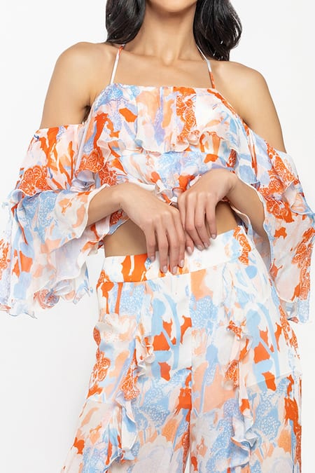 Shop Mandira Wirk Resort White Chiffon Tropical Motifs Halter Neck Top And Slit Pant Set Online at Aza Fashions Shop_Mandira Wirk Resort_White Chiffon Tropical Motifs Halter Neck Top And Slit Pant Set _Online_at_Aza_Fashions