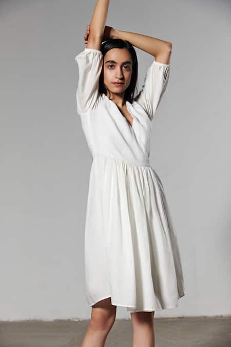Shop Therealb White 100% Milk V Neck Crossover Mini Dress Online at Aza Fashions Shop_Therealb_White 100% Milk V Neck Crossover Mini Dress _Online_at_Aza_Fashions