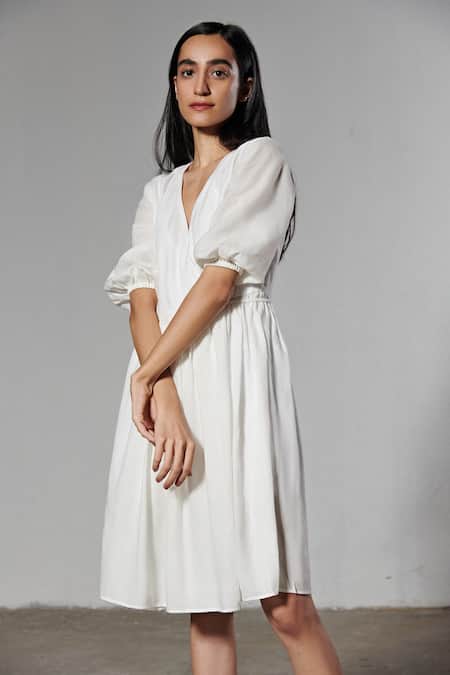 Therealb White 100% Milk V Neck Crossover Mini Dress at Aza Fashions Therealb_White 100% Milk V Neck Crossover Mini Dress _at_Aza_Fashions