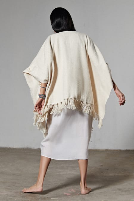 Shop Therealb White Handloom Cotton V Neck Handwoven Poncho at Aza Fashions Shop_Therealb_White Handloom Cotton V Neck Handwoven Poncho _at_Aza_Fashions