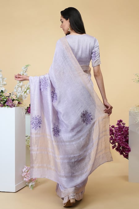 Shop Talking Threads Purple Silk Linen Floral, Zari Jewel Neck Embroidered Saree With Blouse at Aza Fashions Shop_Talking Threads_Purple Silk Linen Floral, Zari Jewel Neck Embroidered Saree With Blouse _at_Aza_Fashions