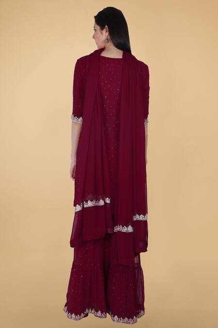Shop Talking Threads Maroon Georgette Mukaish, Tikka Notched Embroidered Kurta Gharara Set at Aza Fashions Shop_Talking Threads_Maroon Georgette Mukaish, Tikka Notched Embroidered Kurta Gharara Set _at_Aza_Fashions
