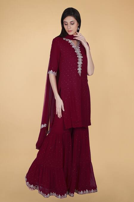 Talking Threads Maroon Georgette Mukaish, Tikka Notched Embroidered Kurta Gharara Set Online at Aza Fashions Talking Threads_Maroon Georgette Mukaish, Tikka Notched Embroidered Kurta Gharara Set _Online_at_Aza_Fashions