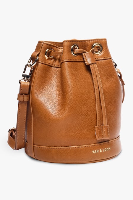 Buy Tan & Loom Brown Bombay Ajustable And Detachable Handle Potli Bag Online at Aza Fashions Buy_Tan & Loom_Brown Bombay Ajustable And Detachable Handle Potli Bag _Online_at_Aza_Fashions