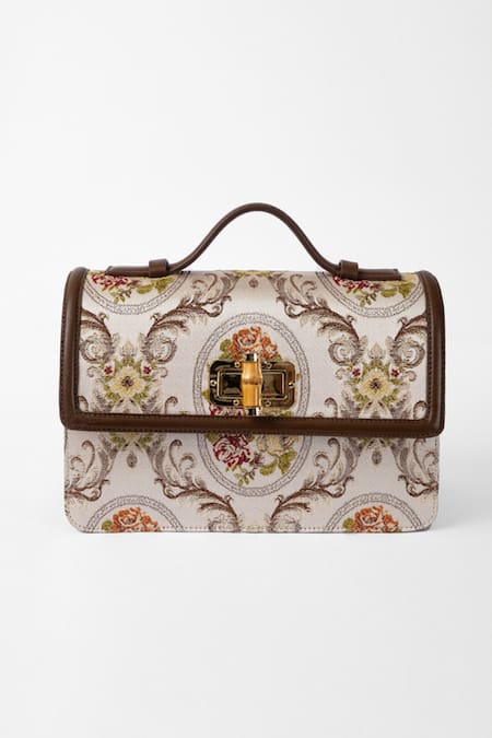 Shop The Leather Garden White Floral Flap Sling Bag at Aza Fashions Shop_The Leather Garden_White Floral Flap Sling Bag _at_Aza_Fashions