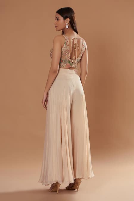 Shop Two Sisters By Gyans Cream Chiffon Sequins, Embroidery V-neck Blouse Flared Pant Set at Aza Fashions Shop_Two Sisters By Gyans_Cream Chiffon Sequins, Embroidery V-neck Blouse Flared Pant Set _at_Aza_Fashions
