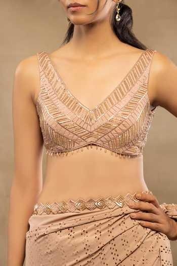 Isha & Shreya_Peach Crepe Embroidery Laser Cut V Neck Zahra Embellished Saree With Blouse_at_Aza_Fashions