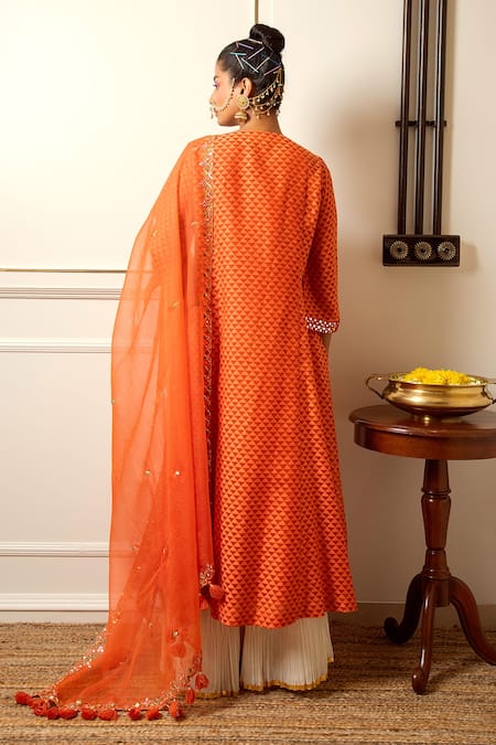 Shop Loka By Veerali Raveshia Orange Organza, Banarasi, Cotton Mul Floral, Mirror Notched Kurta Sharara Set at Aza Fashions Shop_Loka By Veerali Raveshia_Orange Organza, Banarasi, Cotton Mul Floral, Mirror Notched Kurta Sharara Set _at_Aza_Fashions