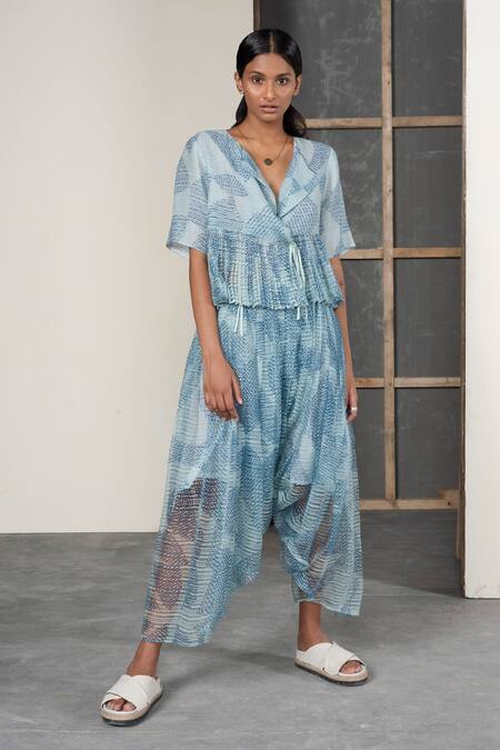 Urvashi Kaur_Blue Linen V-neck Shibori Dyed Pleated Peplum Top _Online_at_Aza_Fashions
