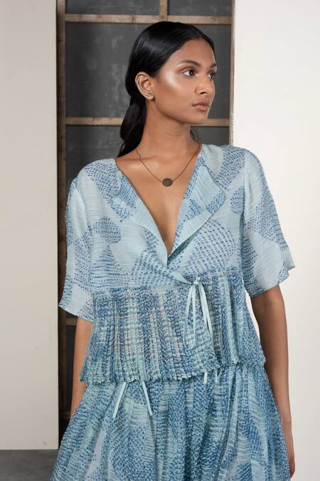 Shop_Urvashi Kaur_Blue Linen V-neck Shibori Dyed Pleated Peplum Top _at_Aza_Fashions