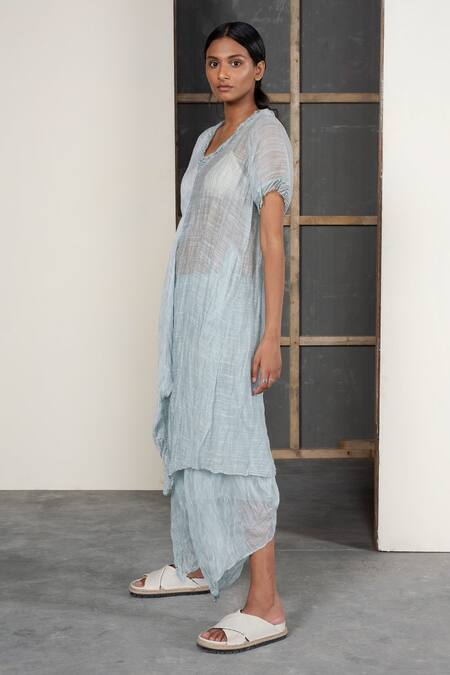 Shop Urvashi Kaur Blue Chanderi Silk Round Neck Asymmetric Crushed Stripe Tunic at Aza Fashions Shop_Urvashi Kaur_Blue Chanderi Silk Round Neck Asymmetric Crushed Stripe Tunic _at_Aza_Fashions