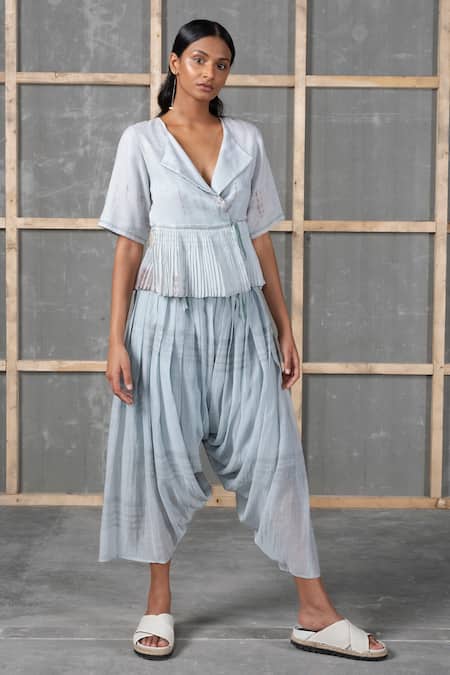 Shop Urvashi Kaur Blue Kota Doria V-neck Pleated Peplum Top With Side Tie-up at Aza Fashions Shop_Urvashi Kaur_Blue Kota Doria V-neck Pleated Peplum Top With Side Tie-up_at_Aza_Fashions