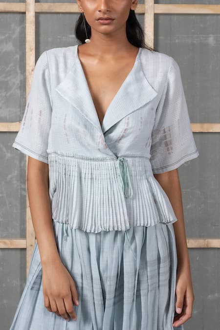 Urvashi Kaur Blue Kota Doria V-neck Pleated Peplum Top With Side Tie-up Online at Aza Fashions Urvashi Kaur_Blue Kota Doria V-neck Pleated Peplum Top With Side Tie-up_Online_at_Aza_Fashions