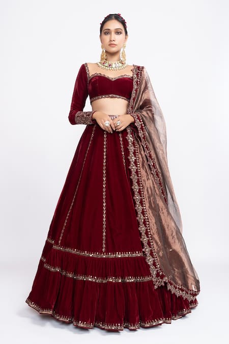 DEEP MAROON LEHENGA SET WITH ALL OVER SILVER PATTERNED EMBROIDERY PAIRED  WITH A MATCHING DUPATTA AND SILVER EMBELLISHMENTS. - Seasons India