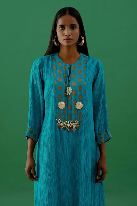 Buy 5elements Blue Pleated Polyester Mix Embellishment Brooch Notched Tunic Online at Aza Fashions Buy_5elements_Blue Pleated Polyester Mix Embellishment Brooch Notched Tunic _Online_at_Aza_Fashions