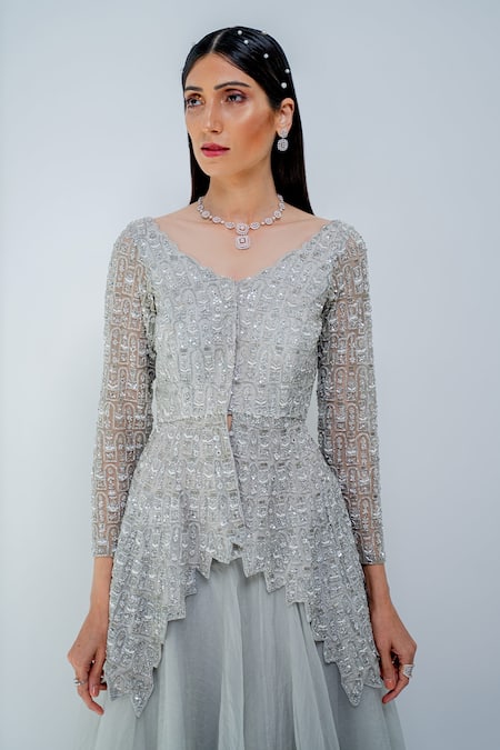 Shop Varun Chakkilam Silver Net, Silk Organza Glass Beads V Neck Embroidered Peplum Top And Skirt Set at Aza Fashions Shop_Varun Chakkilam_Silver Net, Silk Organza Glass Beads V Neck Embroidered Peplum Top And Skirt Set_at_Aza_Fashions
