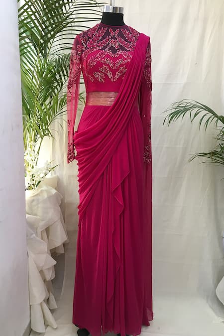 Zenon - Introducing our Quasar Sari Gown, adorned with exquisite  embroideries that capture the essence of romance. This gown features a  luxurious silk chiffon drape with cascading fringes, perfect for making a