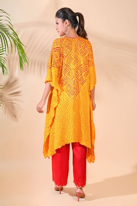 Shop Dyelogue Yellow Gajji Silk V Neck Bandhani Asymmetric Kurta at Aza Fashions Shop_Dyelogue_Yellow Gajji Silk V Neck Bandhani Asymmetric Kurta _at_Aza_Fashions