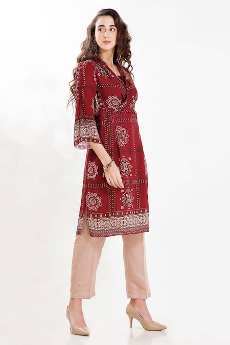 Shop Whimsical By Shica Maroon Cotton Silk V Neck Printed Tunic at Aza Fashions Shop_Whimsical By Shica_Maroon Cotton Silk V Neck Printed Tunic _at_Aza_Fashions